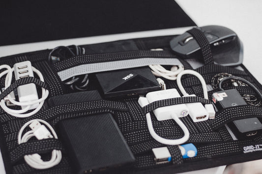 a black case filled with electronics and cords