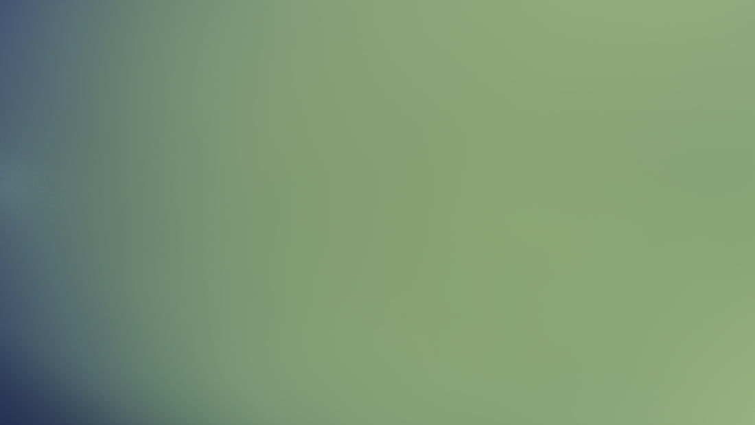 The image shows a blurry, greenish-blue gradient.