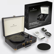 Contenido del tocadiscos Akane: maletín, adaptador, manuales, aguja y almohadilla