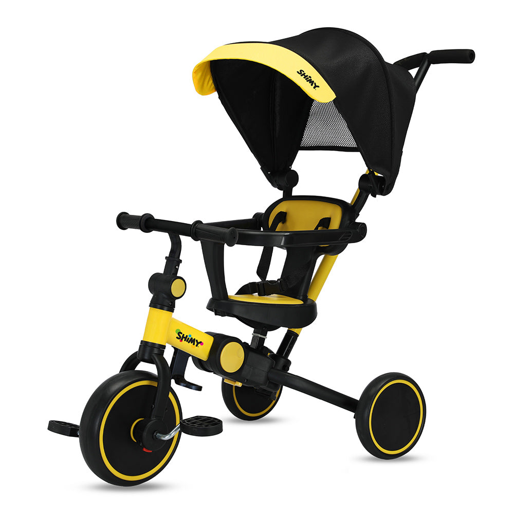 Triciclo evolutivo Shimy 5 en 1 negro y amarillo con toldo, asiento y manubrio de empuje
